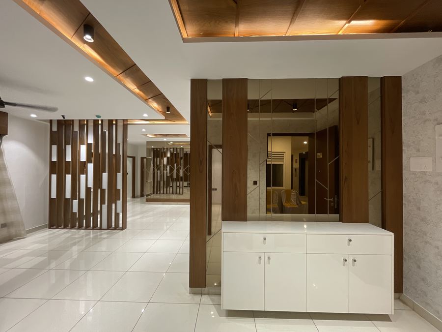 Foyer and living area with mirrored feature wall
