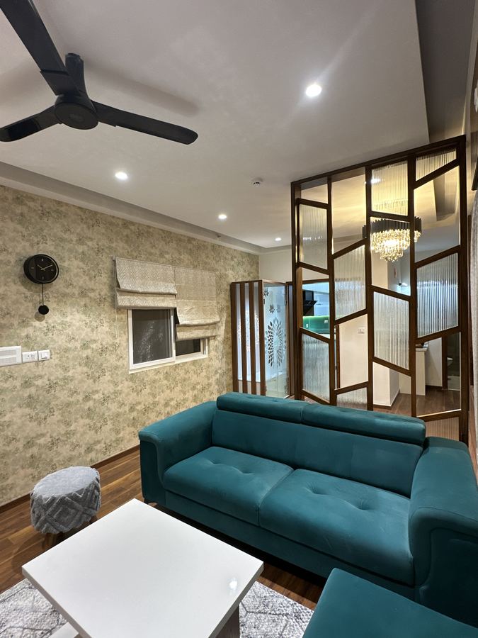 Living room with chandelier and layered lighting